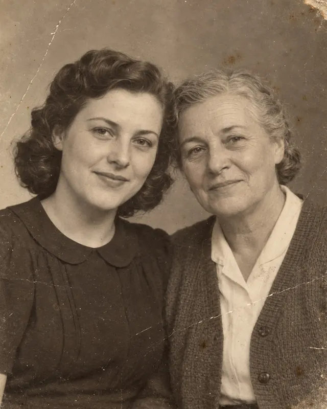 A mother and her grown daughter in a studio, before: the faded, creased print.